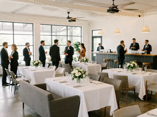 Event furniture rental setup in an elegant wedding reception, showcasing stylish tables, lounge areas, and décor.